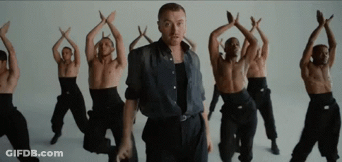 Man Dancing With Shirtless Men GIF