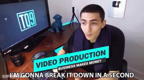 Man Desk Sign Video Production Business Makes Money GIF