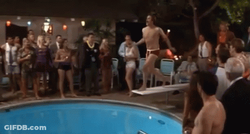 Man Diving Into Pool As Crowd Watches GIF