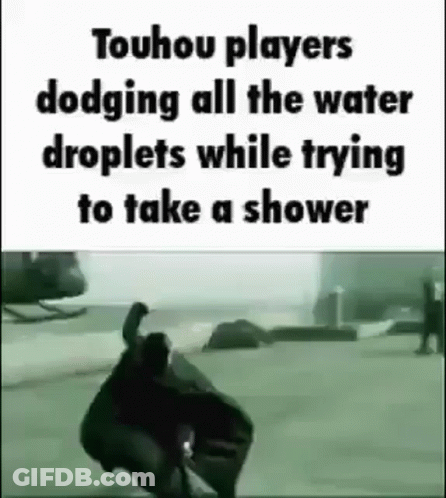 Man Dodging Water Droplets While Showering GIF