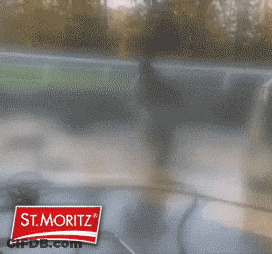 Man Dodging Water Splash By Fire Hose GIF