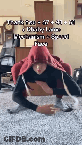 Man Doing Floor Trick With Red Hoodie GIF