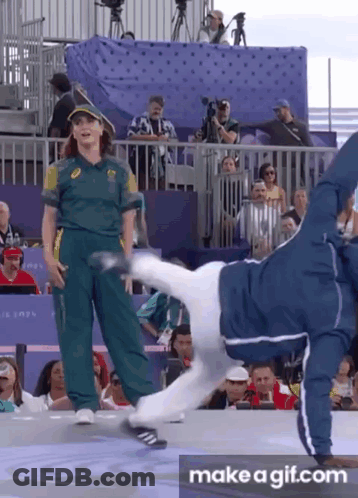 Man Doing Handstand In Front Of Crowd GIF