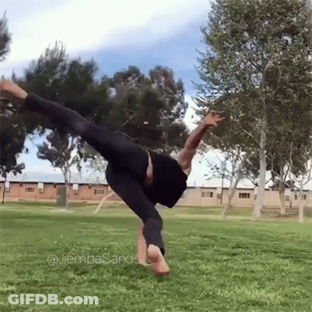 Man Doing Handstand In Park GIF