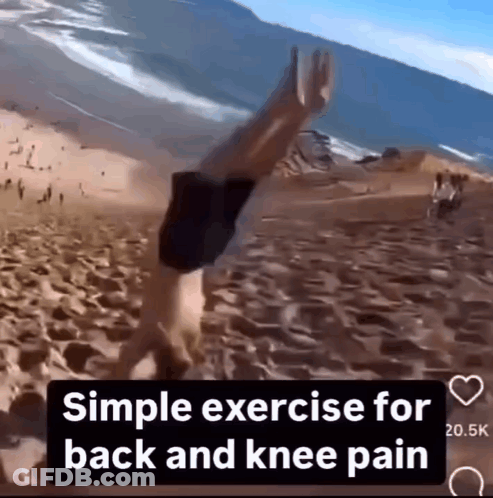 Man Doing Handstand On Beach GIF