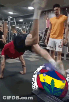 Man Doing Handstand While Man In 93 Shorts Watches GIF