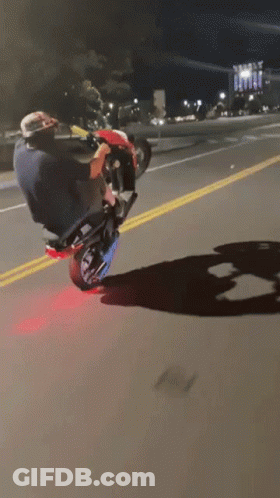 Man Doing Motorcycle Trick GIF