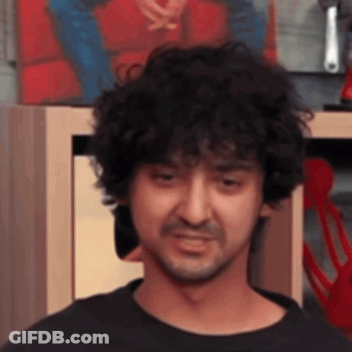 Man Doing Pull Ups Holding Pipe In Mouth GIF