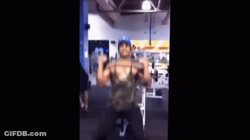 Man Doing Pull Ups In Gym GIF