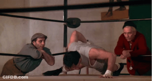 Man Doing Push Ups In Boxing Ring With Watcher GIF