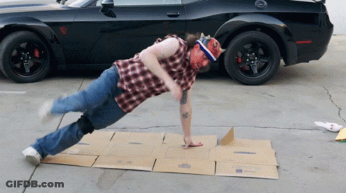 Man Doing Push Ups On Cardboard Box GIF