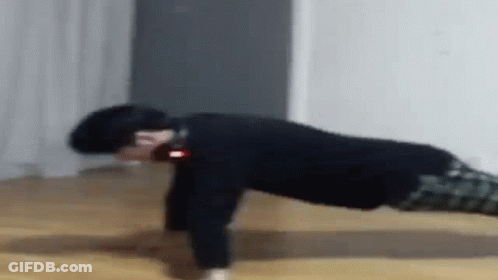Man Doing Push Ups On Floor GIF