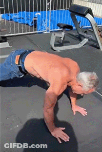 Man Doing Push Ups On Mat GIF