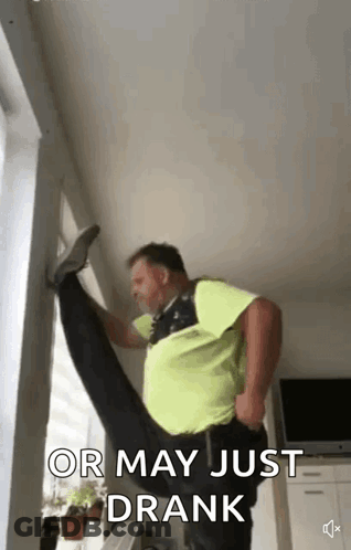 Man Doing Split Next To Window GIF