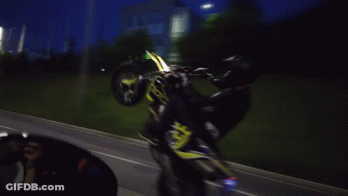 Man Doing Trick On Motorcycle Number 15 GIF