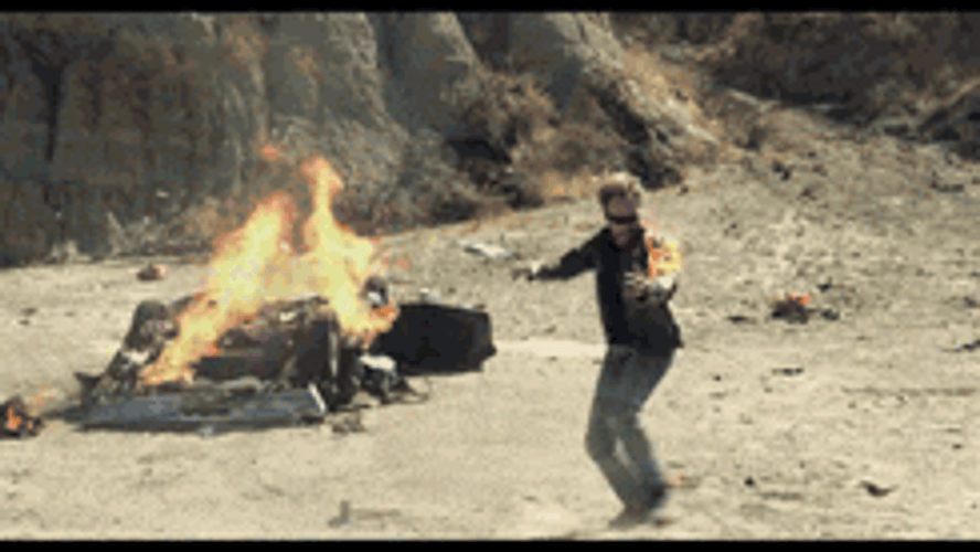 Man Douse A Small Tornado Of Fire On His Arm GIF