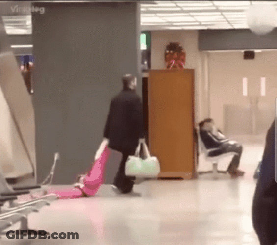 Man Dragging Someone On The Airport GIF