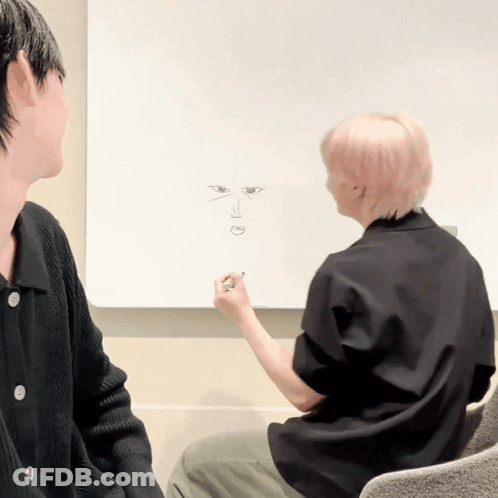 Man Drawing Face On Whiteboard GIF