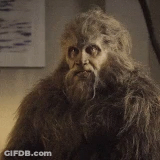 Man Dressed As Bigfoot With Beard GIF