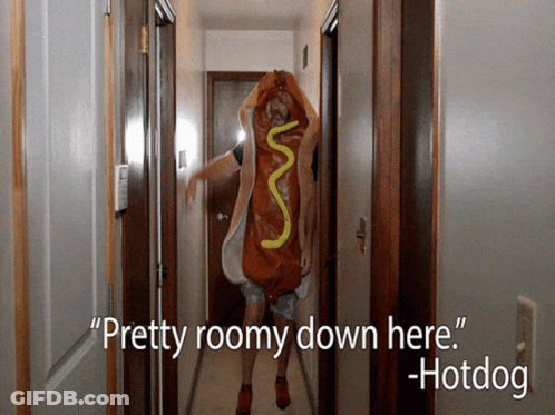 Man Dressed As Hotdog Walking Down Hallway GIF