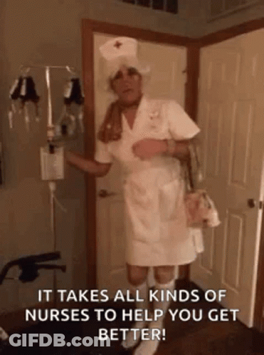Man Dressed As Nurse Holding Bag GIF
