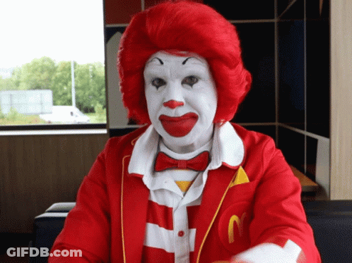 Man Dressed As Ronald McDonald With Red Hair GIF