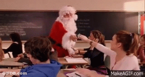 Man Dressed As Santa Claus In Classroom GIF