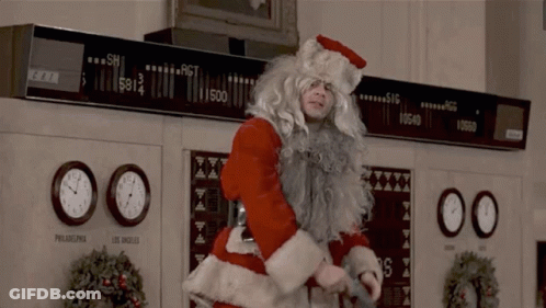 Man Dressed As Santa Claus In Front Of Philadelphia Clock GIF