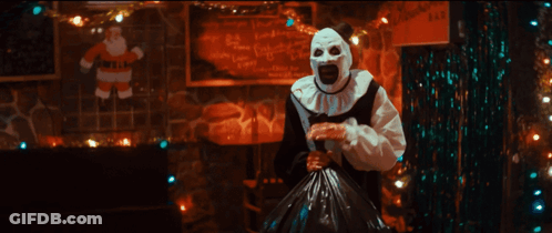 Man Dressed As Santa Claus With Skull Face GIF