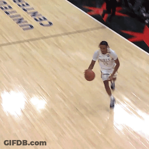 Man Dribbling Basketball At United Center GIF