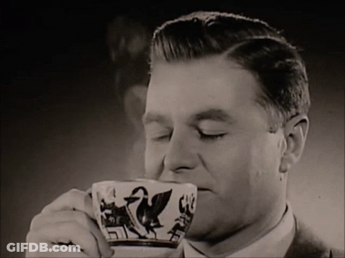 Man Drinking Coffee With Duck GIF