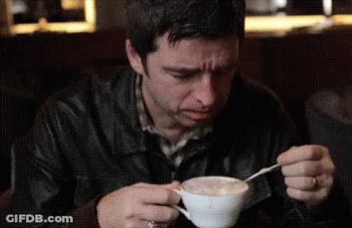 Man Drinking Coffee With Spoon GIF
