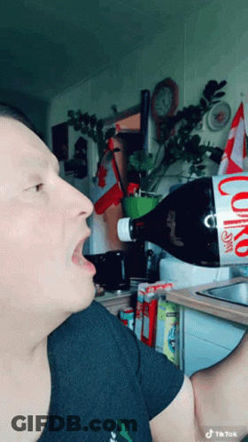 Man Drinking Diet Coke GIF