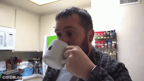 Man Drinking From Apple Logo Cup GIF