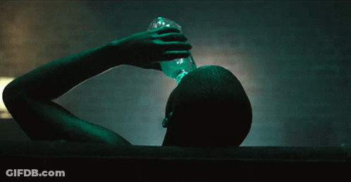 Man Drinking From Bottle In Bathtub GIF