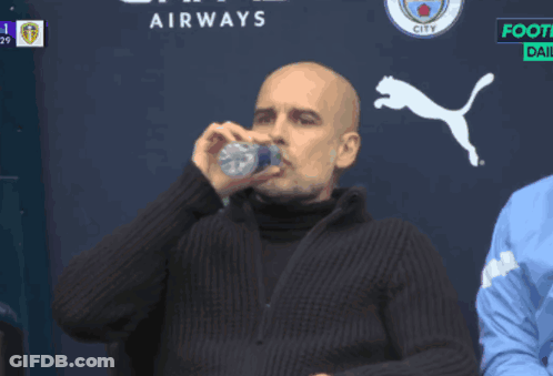 Man Drinking From Bottle In Front Of Airways Logo GIF