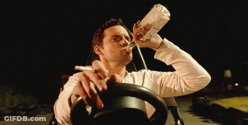 Man Drinking From Bottle Smoking Cigarette GIF