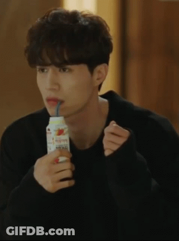 Man Drinking From Bottle With Straw GIF