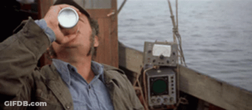 Man Drinking From Can On Boat GIF