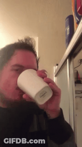 Man Drinking From Cup Saying Johnson GIF