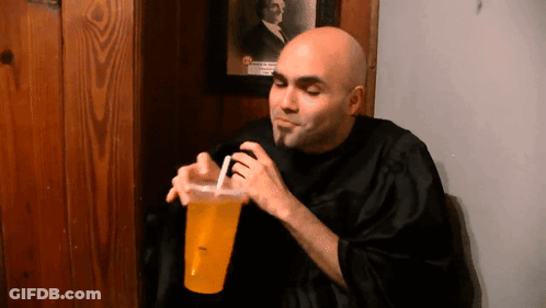 Man Drinking From Cup With Straw GIF