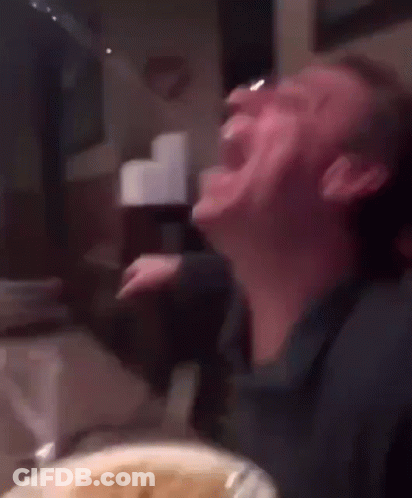 Man Drinking From Glass At Table With Food GIF