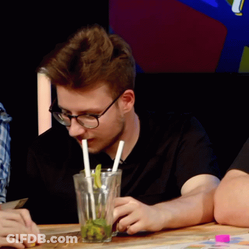 Man Drinking From Glass With Two Straws GIF