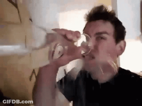 Man Drinking From Glass GIF