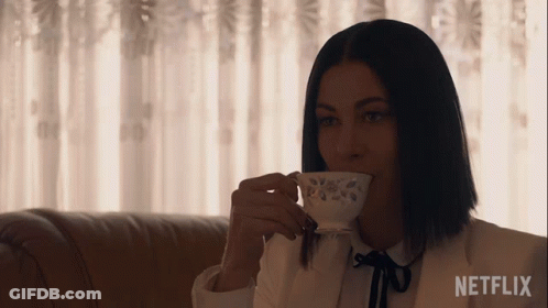 Man Drinking From Square Pattern Mug GIF