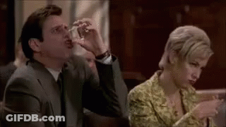 Man Drinking From Star Wars Mug In Front Of Storm Trooper Helmet GIF