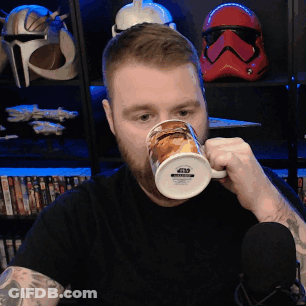 Man Drinking From Star Wars Mug With Stormtrooper Helmet GIF
