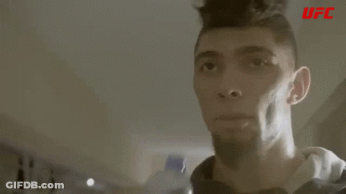 Man Drinking From UFC Bottle GIF