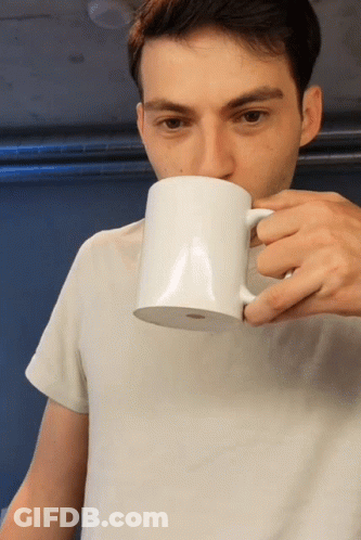 Man Drinking From White Coffee Mug GIF