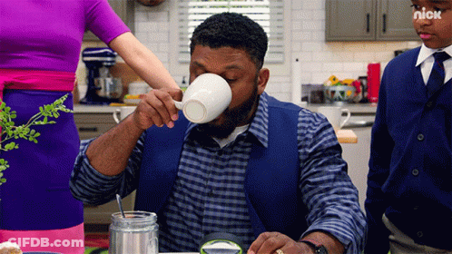 Man Drinking From White Cup With Nick Logo GIF